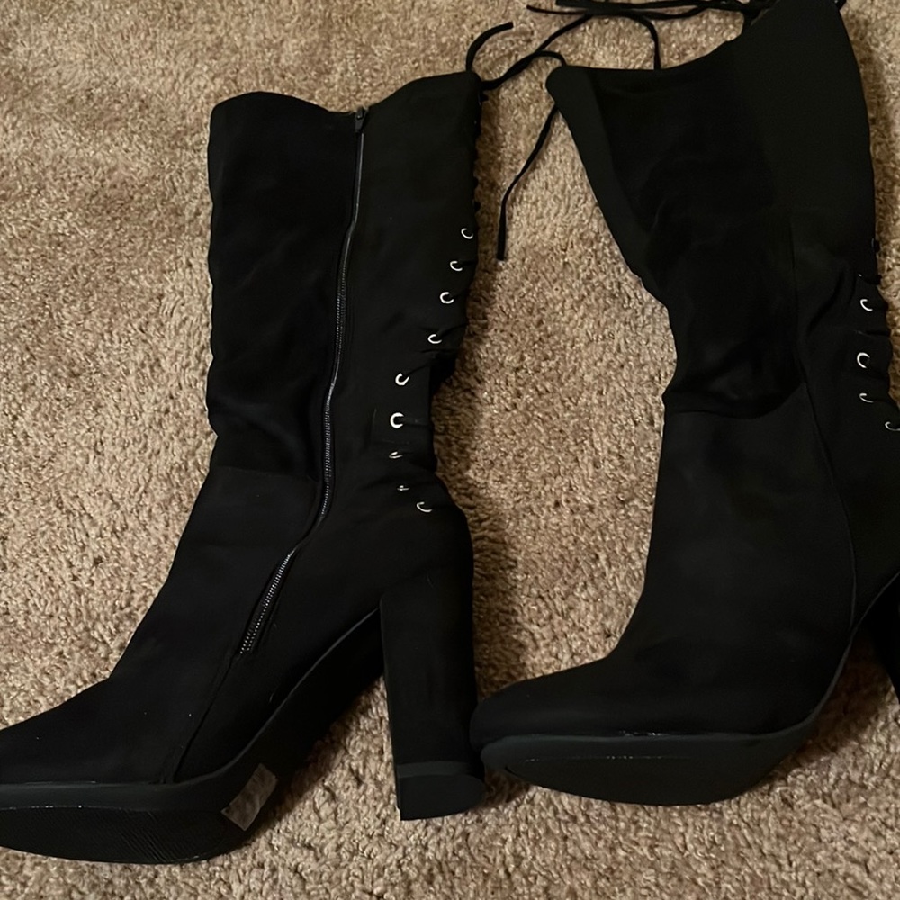 Black suede boots size 9,nerves been worn nice boots for the winter